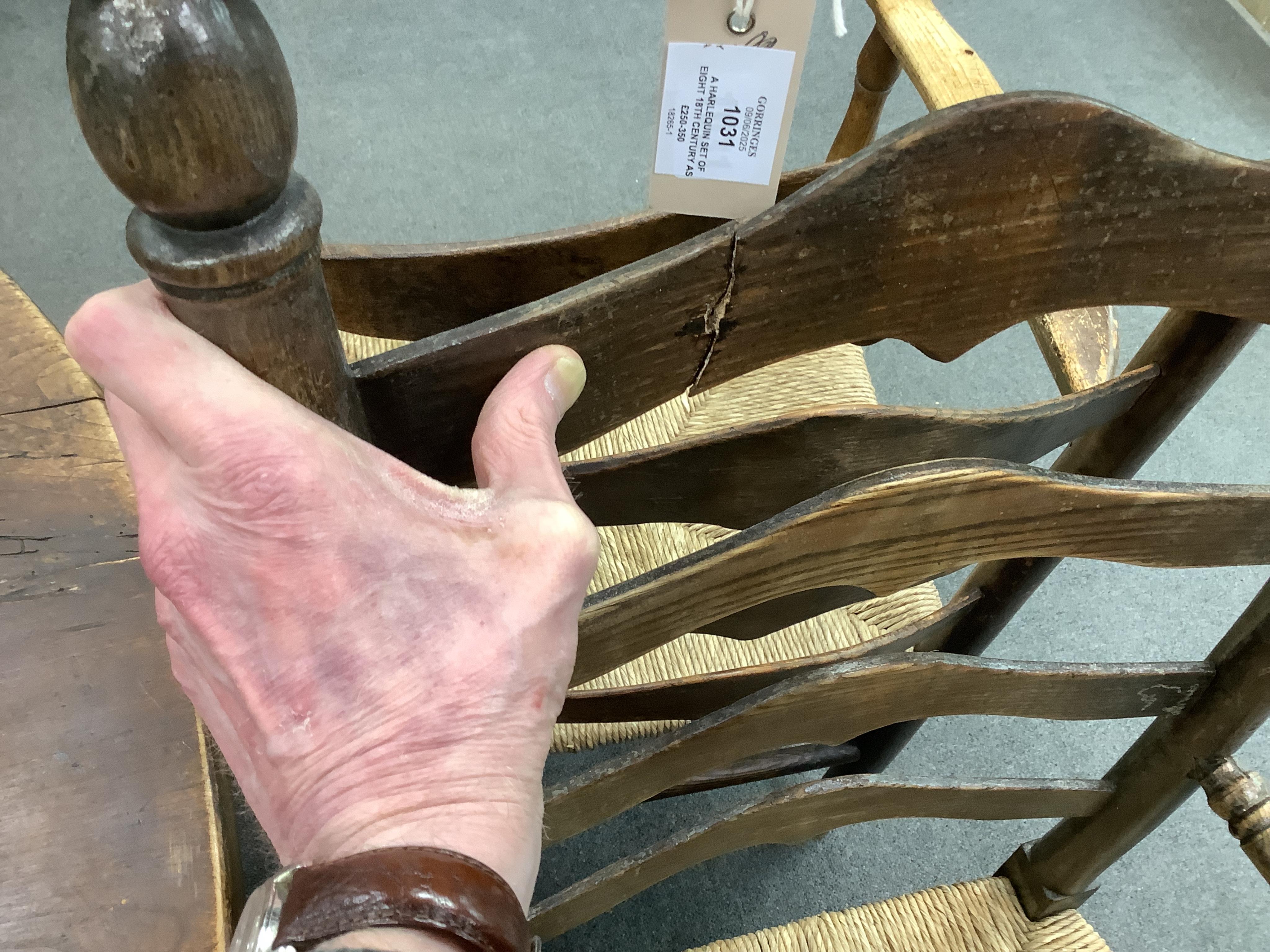A harlequin set of eight 18th century ash ladderback rush seat dining chairs, two with arms